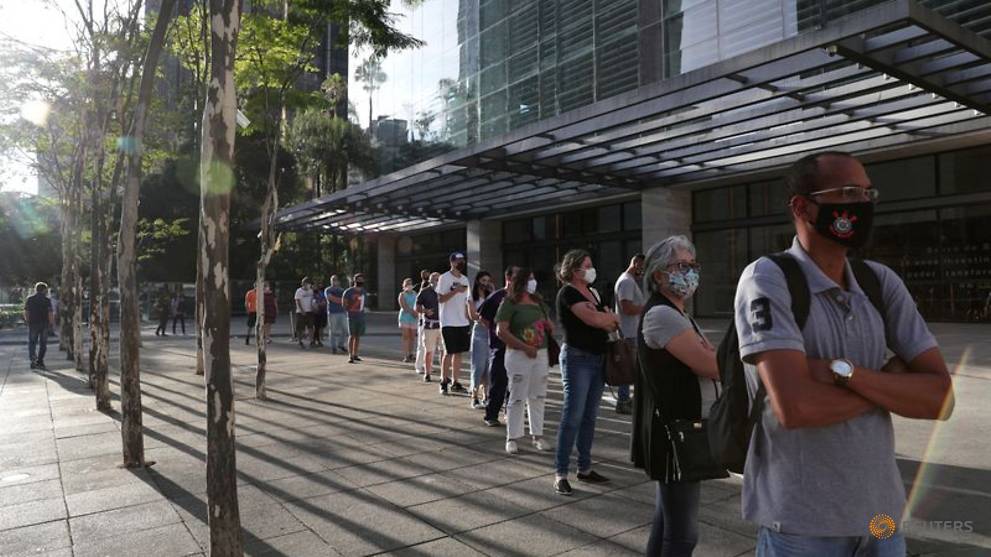 As Brazil's COVID-19 deaths surge, WHO says hospital system coping