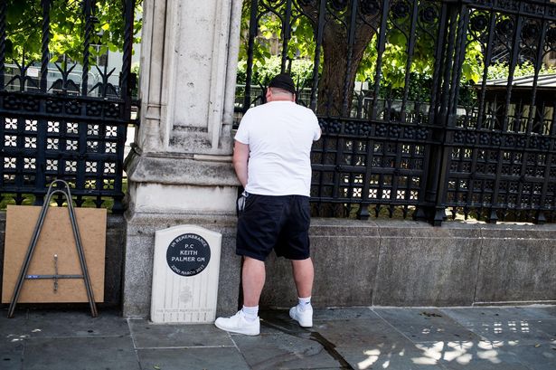 Fury as yob urinates next to PC Keith Palmer memorial during far-right protest