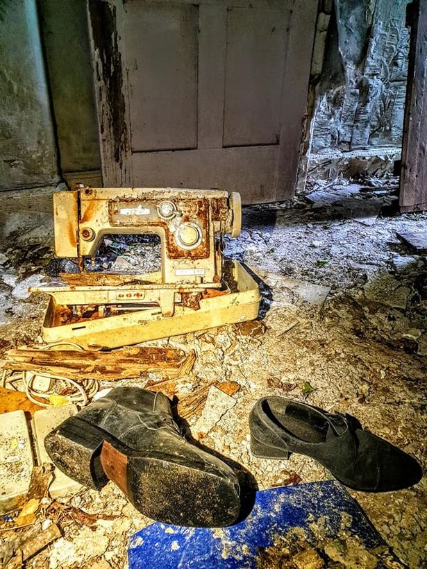 Inside abandoned house caked in dirt and rubble that transports you back in time