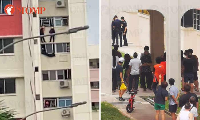 Woman apprehended after getting rescued by DART officers at Yishun block
