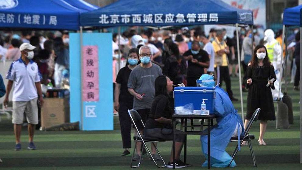 COVID-19: Mass testing in Beijing after new cluster triggers lockdowns