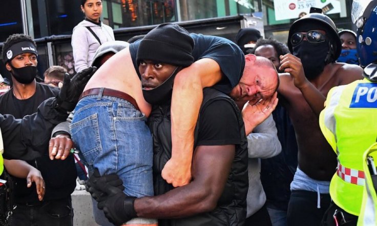 Patrick Hutchinson: Black Man Carries 'Rival' White Protester to Safety Amid Violence