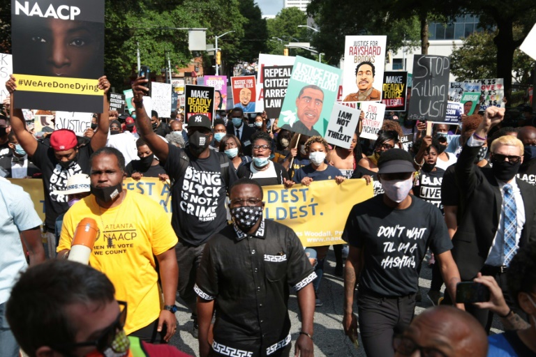 'We are done dying': protesters march on Georgia capitol