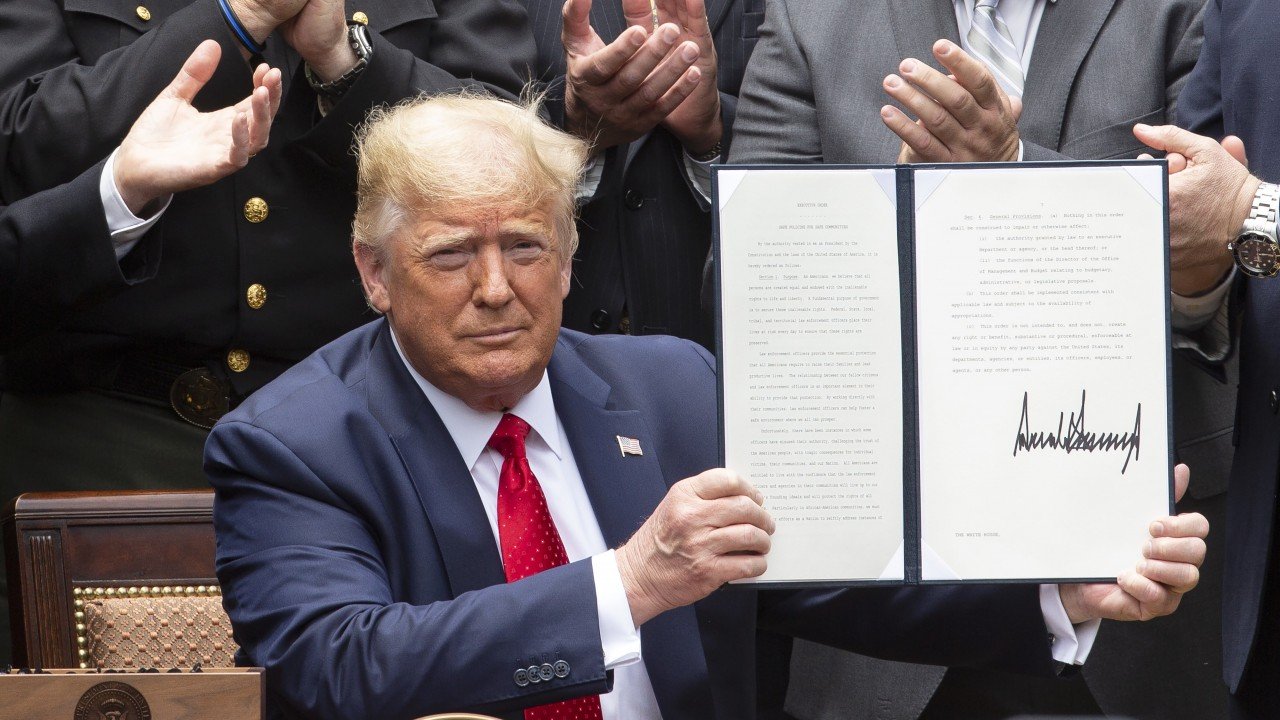 Donald Trump signs executive order on police reform after weeks of protests sparked by death of George Floyd