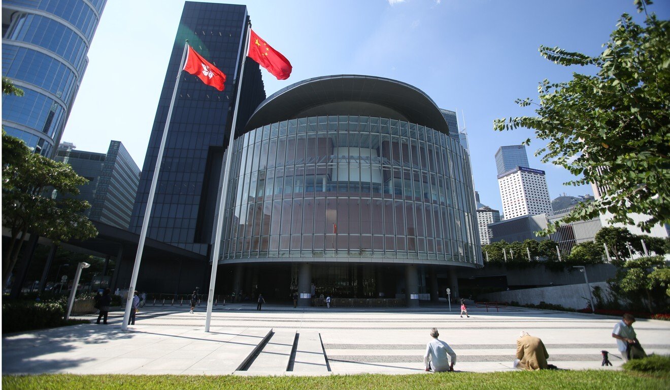 National security law: Hong Kong official drops hints that election candidates could be barred for opposing new legislation