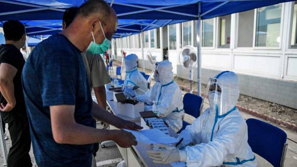 Beijing cancels flights, shuts schools over new COVID-19 outbreak