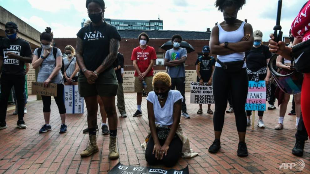 Atlanta police officer charged with murder for shooting black man