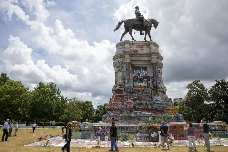 Confederate statues fall as winds of change buffet American south