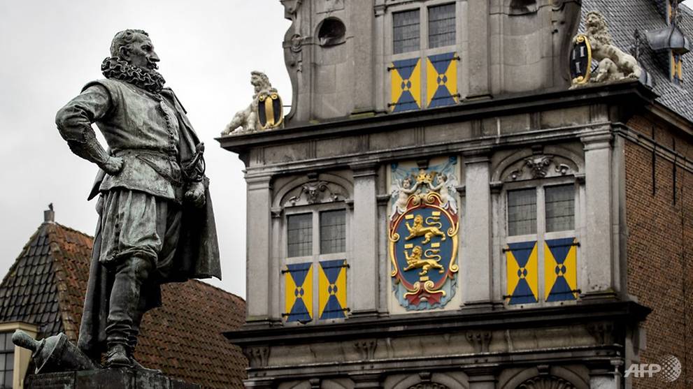 Dutch police break up rowdy rallies at colonial-era statue