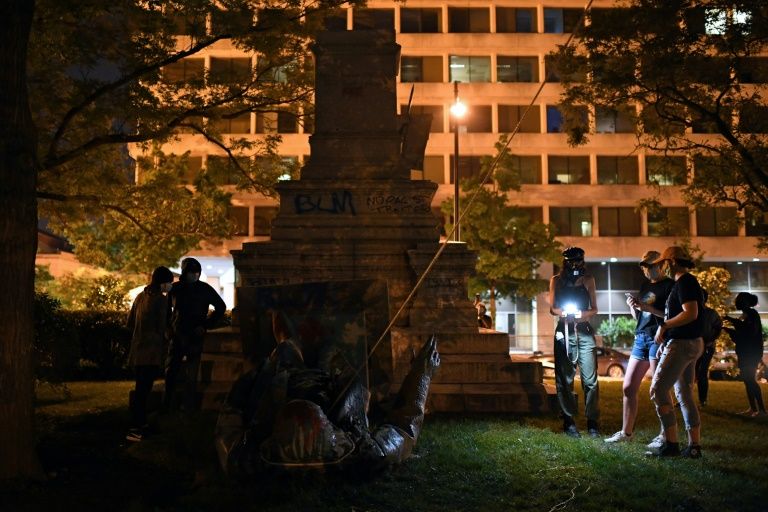 Protesters topple Washington dc statue of confederate general: media
