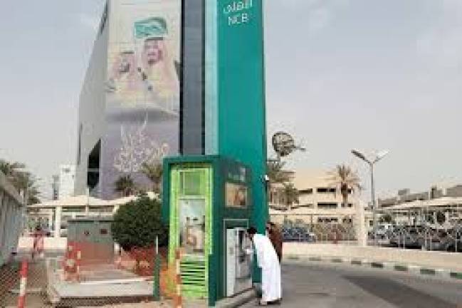 Saudi Arabia’s biggest lender National Commercial Bank signs potential merger deal with Samba Financial