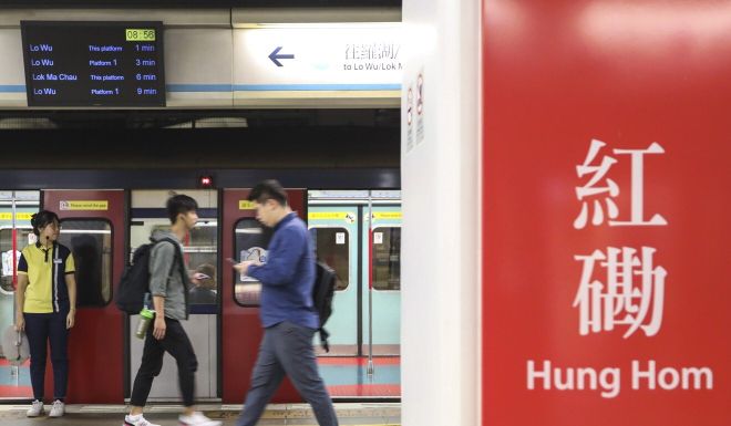 Hong Kong rail operator mtr corporation to investigate near miss between train and maintenance workers