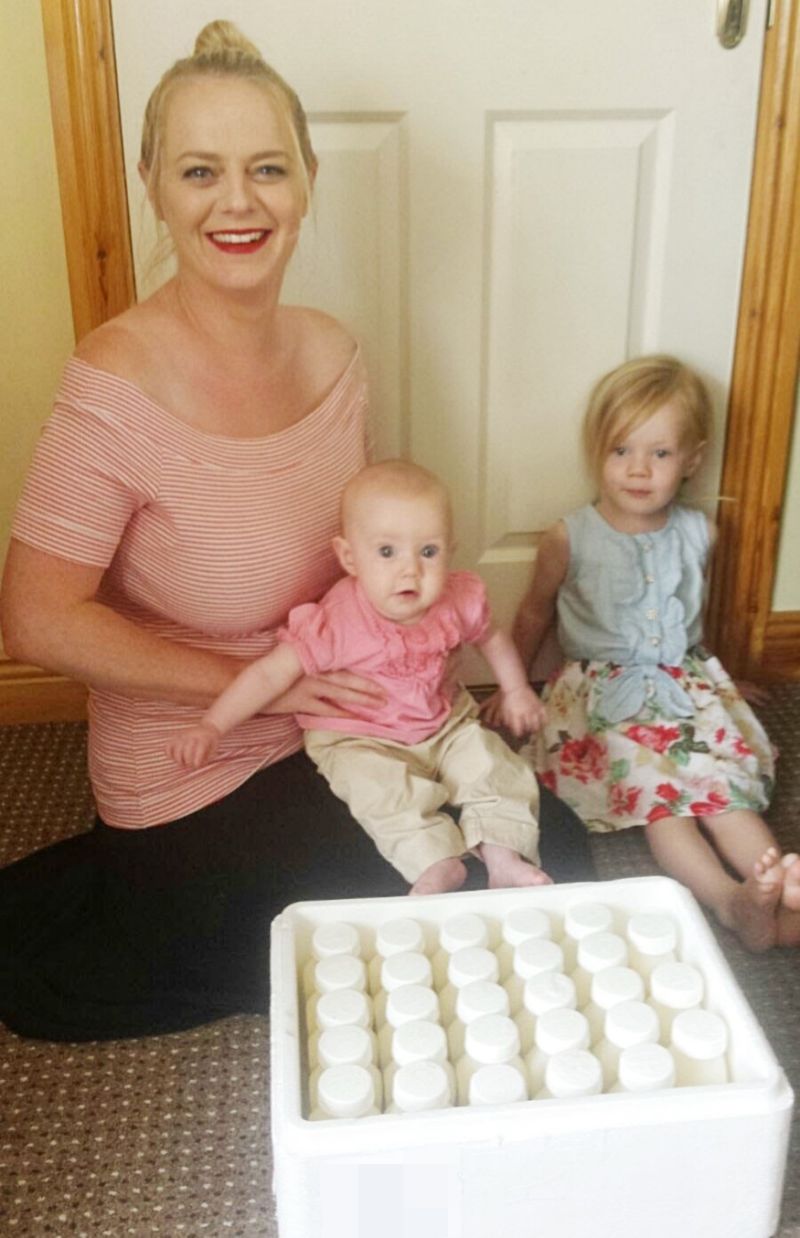 Mum who tandem breastfed her daughters, aged 4 and 5, credits extended breastfeeding for their hardy immune systems