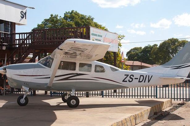 Brit pilot had 99 per cent burns after plane crash but carried woman for a mile to safety