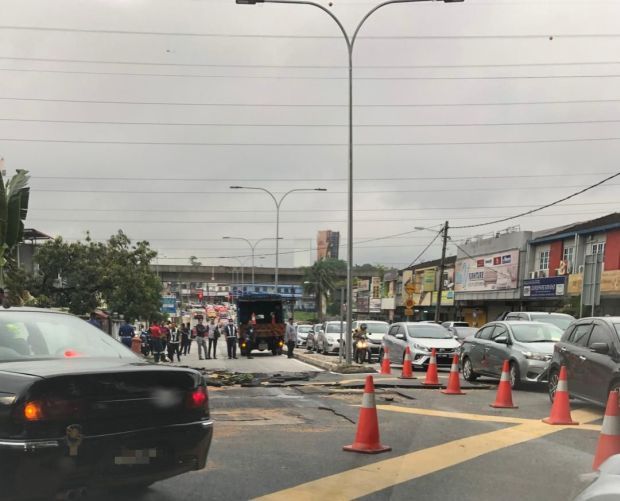 Road near Taman Bahagia LRT station in PJ damaged due to flooding