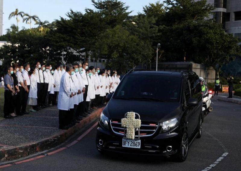Symbolic last trip for Taiwan's 'Mr Democracy' before cremation