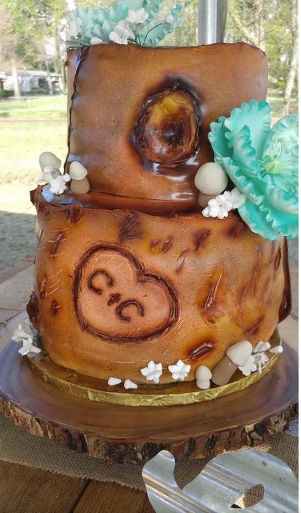 Newlyweds shamed for wedding cake that looks like 'burnt and mutilated cow flesh'