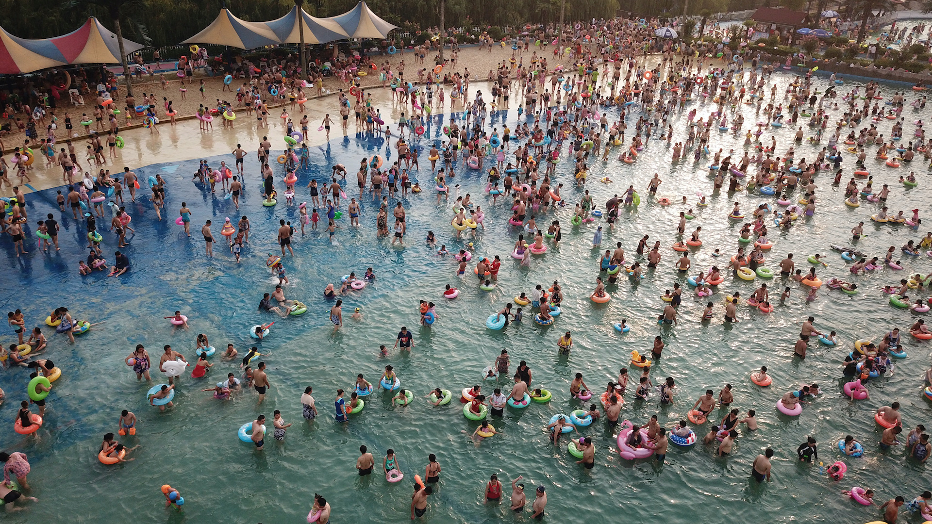 Thousands Gather for Pool Party in Wuhan, China, Where COVID-19 First Appeared