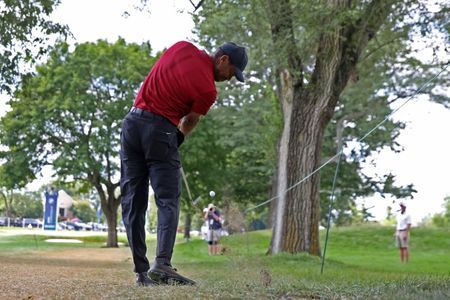 Woods aims to 'clean up' rounds ahead of U.S. Open