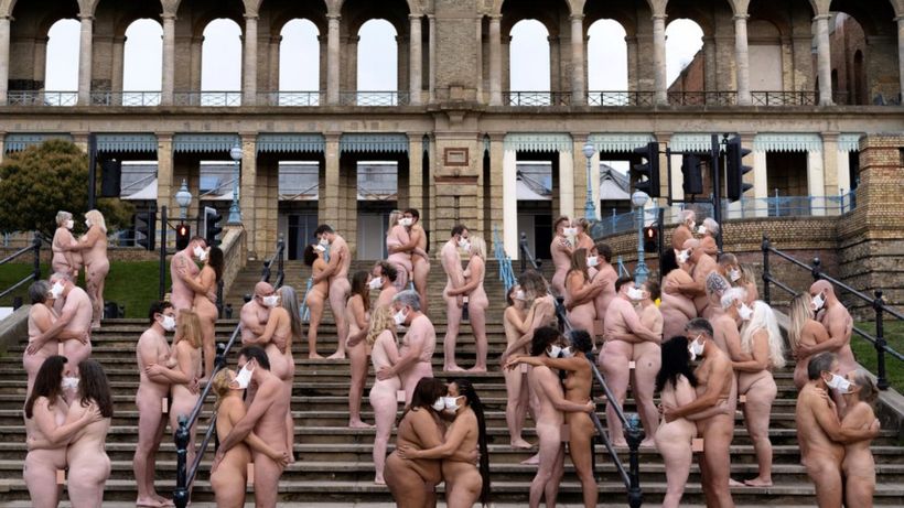 Nudes wear masks in Spencer Tunick installation