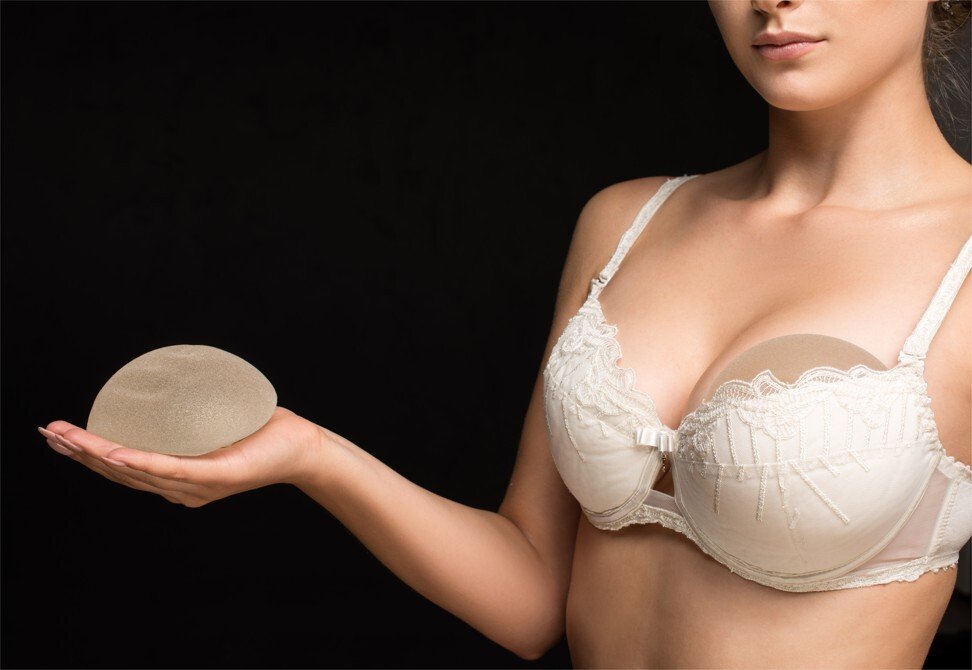 Chrissy Teigen, Pamela Anderson, Victoria Beckham – why breast reduction surgery is on the rise as women embrace a more natural look