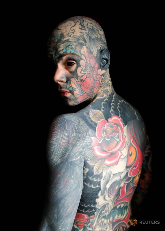 Frenchman says tattoos cost him kindergarten teaching job