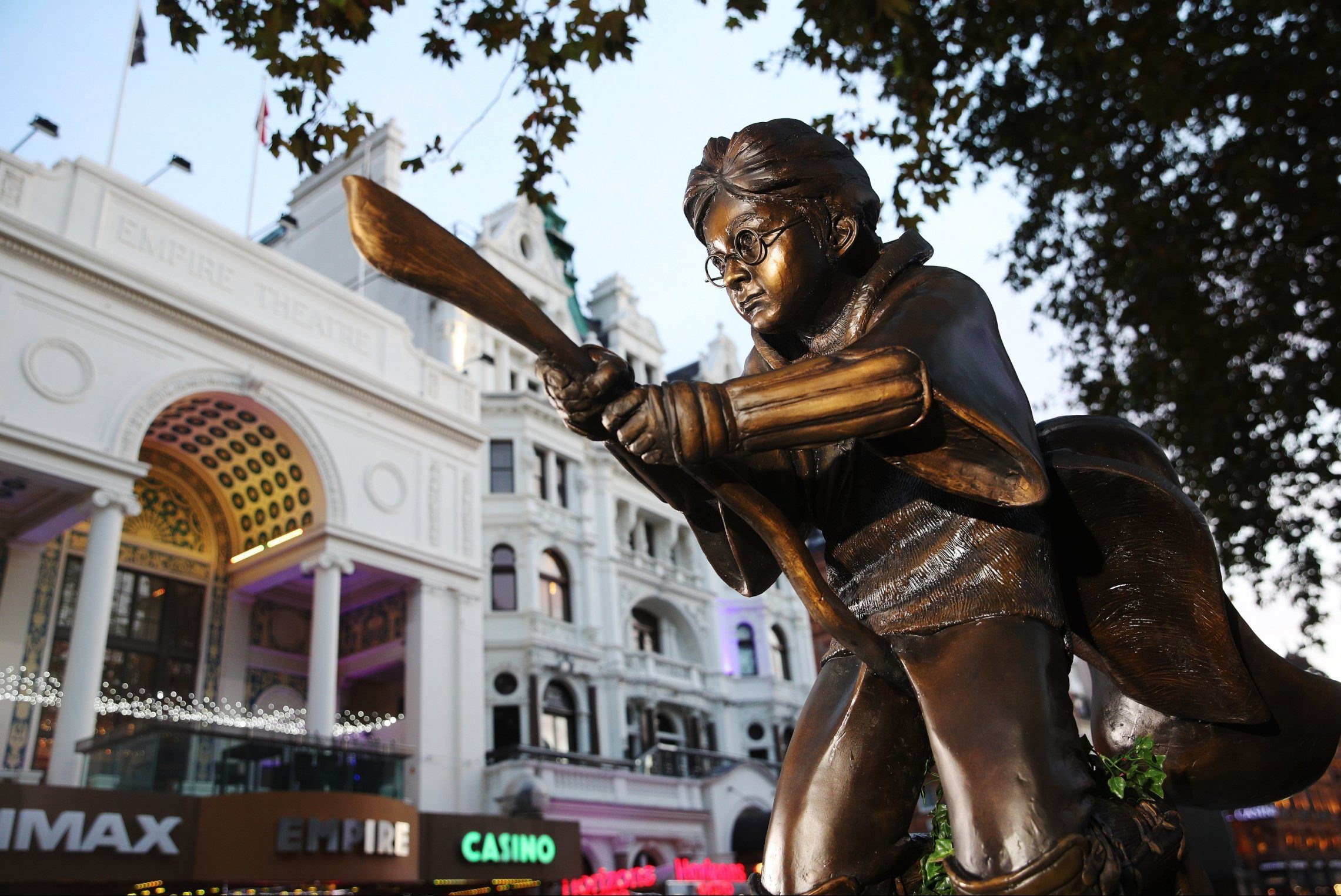 Giant flying Harry Potter statue unveiled in Leicester Square alongside Batman and Mr Bean