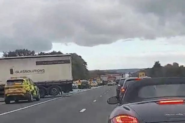 M26 crash: Two dead and one fighting for life as flatbed van smashes into lorry