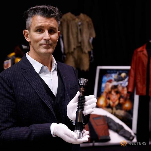 Star Wars lightsaber, Pretty Woman boots up for sale in movie memorabilia auction