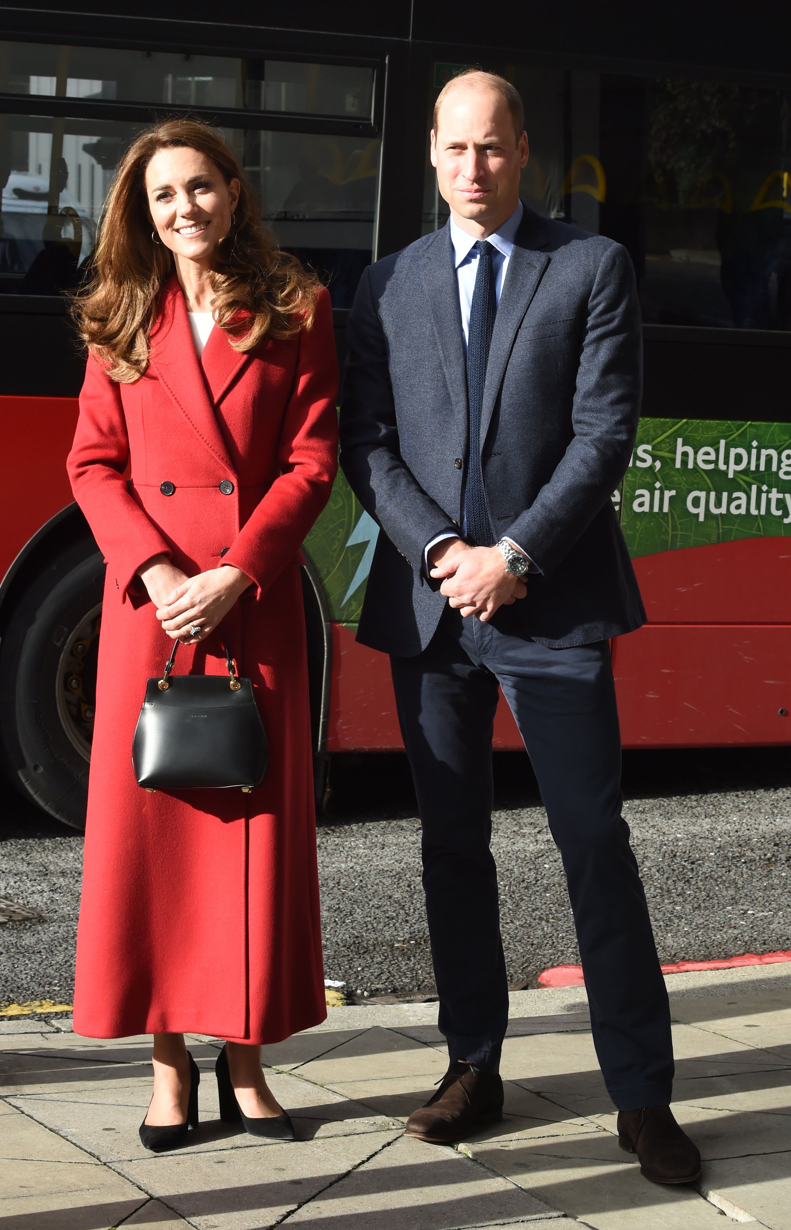 Kate Middleton Wraps Up in a Crimson Alexander McQueen Coat at Waterloo Station