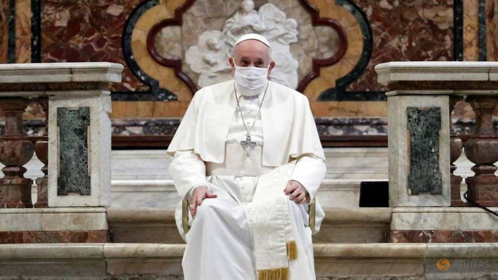 Pope Francis wears mask for first time at public service