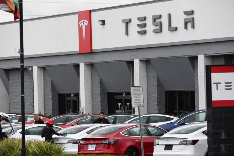 Tesla profit doubles as electric car deliveries surge