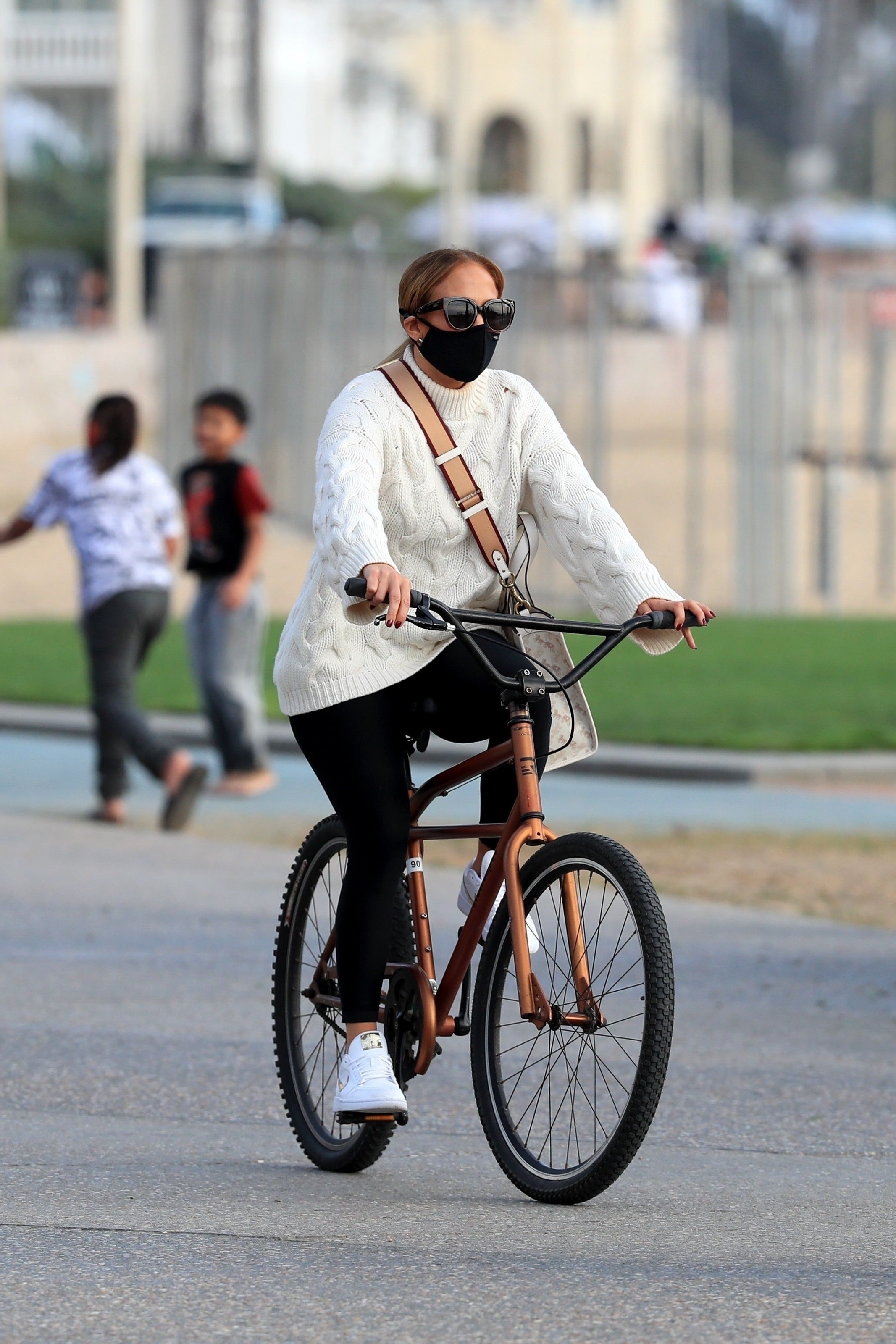 Jennifer Lopez Displays Her Chic Fall Style During A Bike Ride With Twins Emme And Max Nestia