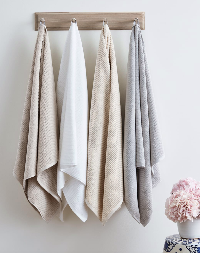 The Coziest Towel Sets & Warmers to Make Your Bathroom Feel Like a Spa