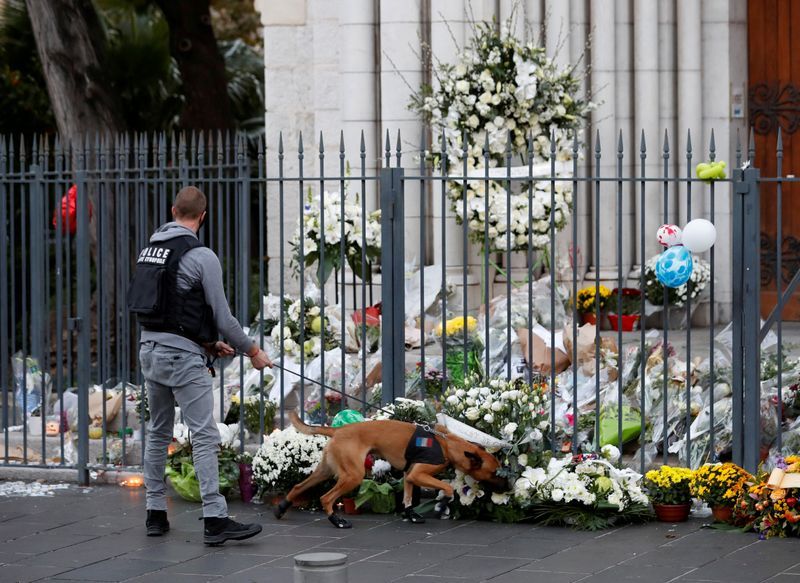 French prosecutors: Nice church attack and teacher's beheading are linked