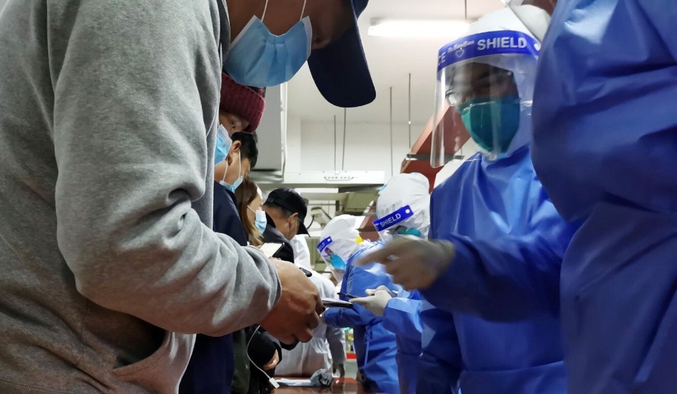 Coronavirus: mass testing of Shanghai airport workers as city reports new cases