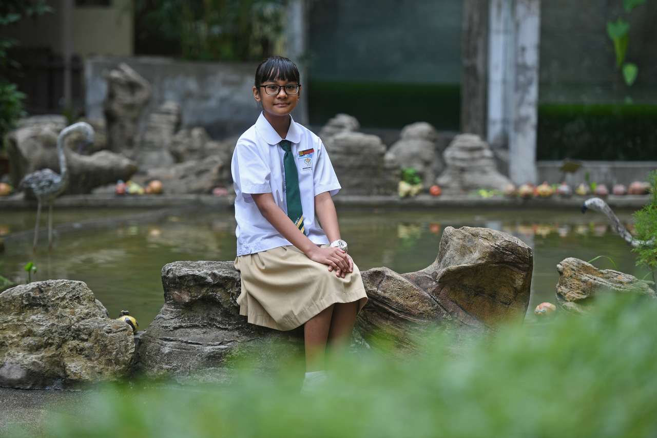 Parents collect PSLE results of son who died from cancer