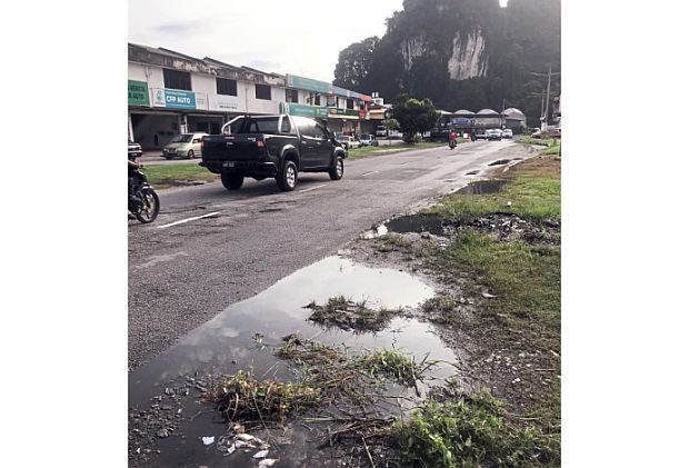 Residents in Ipoh want pothole-riddled roads fixed