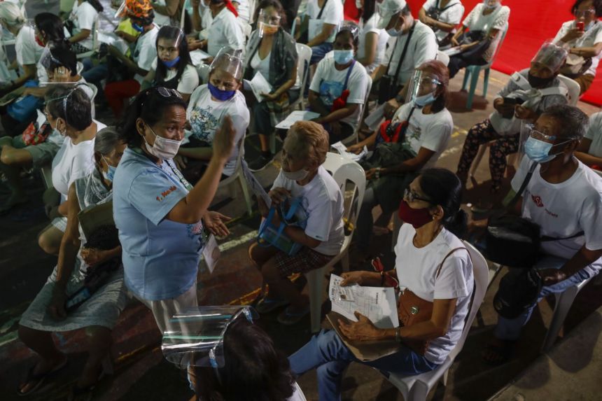 Philippines extends partial coronavirus curbs in Manila to end of year