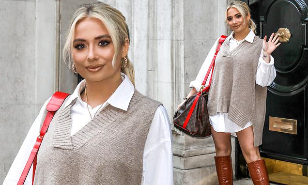 Saffron Barker flashes her toned legs in a shirt dress as she promotes her hearing loss documentary