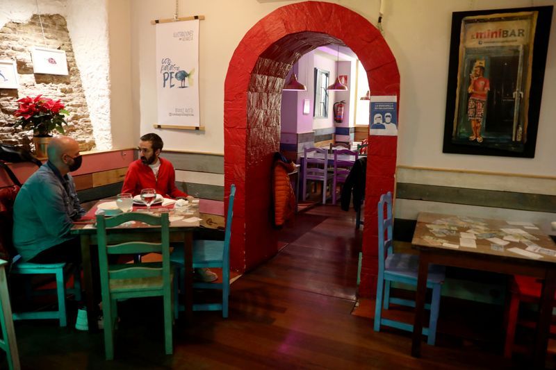 Madrid customers prepay for drinks to save bar on the rocks from the pandemic