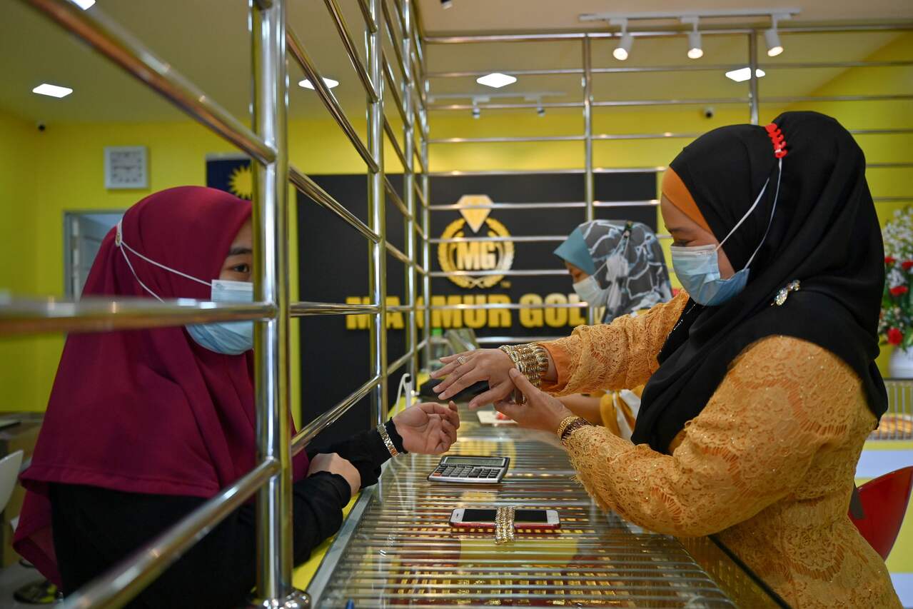 Malaysian goldsmiths mould a profit out of coronavirus pandemic