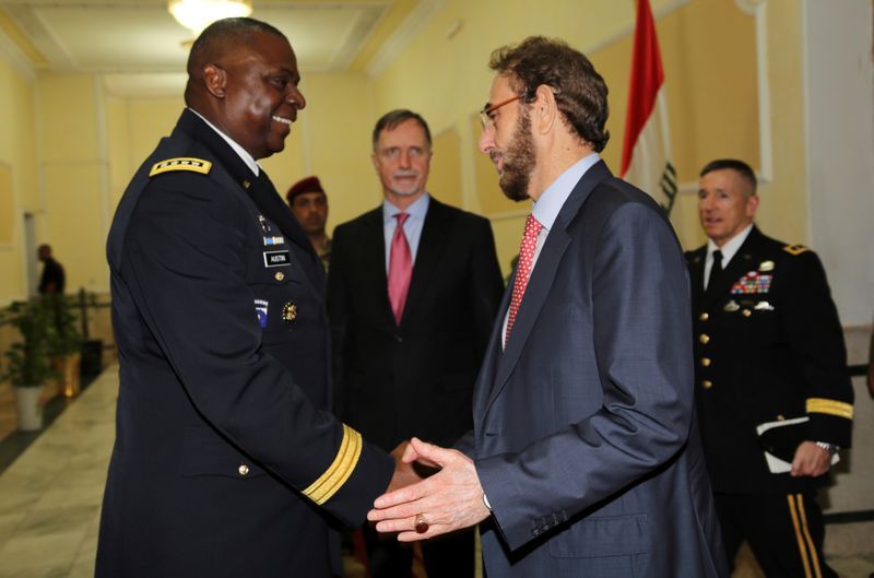 Intensely private, Biden's pick for defense secretary is thrust into eligibility battle