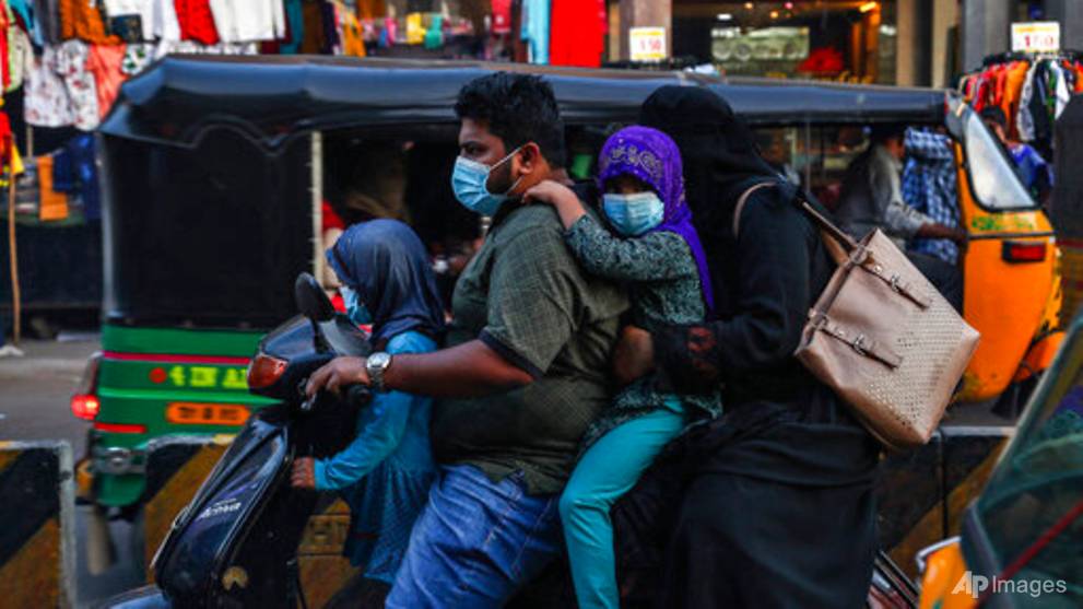 India's COVID-19 case level a third of its September peak