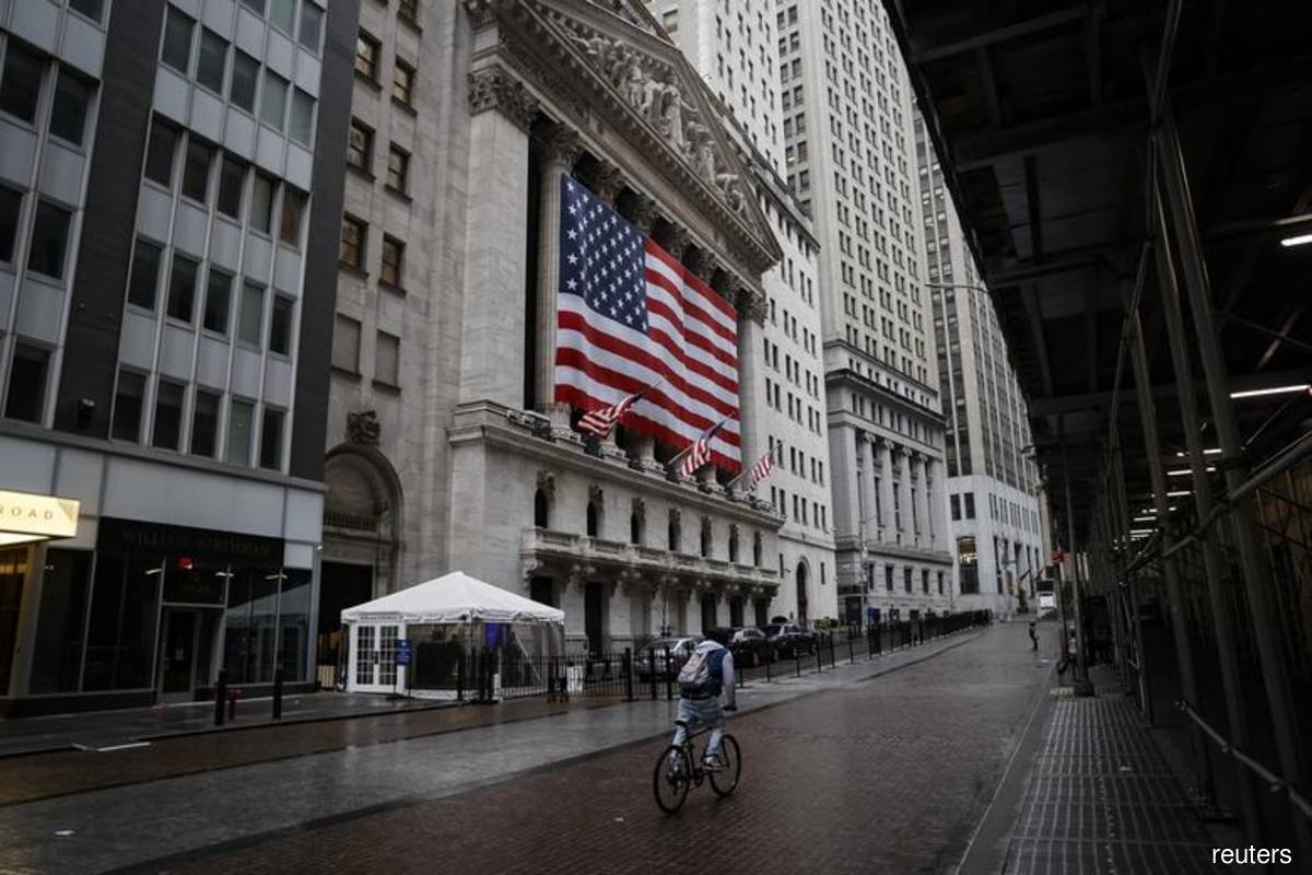 Wall Street mixed as Apple and Tesla retreat