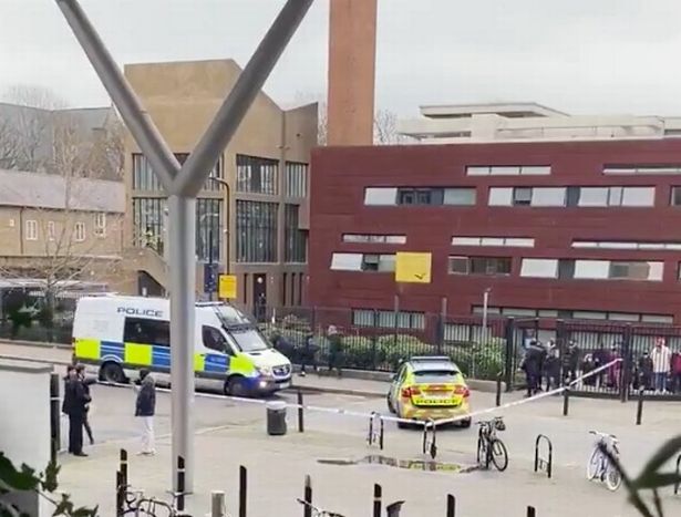 Police evacuate pupils from school after bomb threat as officers cordon off road