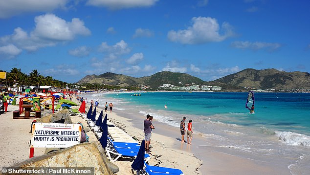 Female tourist, 39, is killed after shark rips her leg off as she swam off of Caribbean island Saint Martin