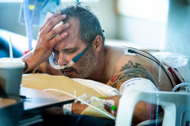 Tragic last photo shows dad with Covid-19 struggling to breathe before dying
