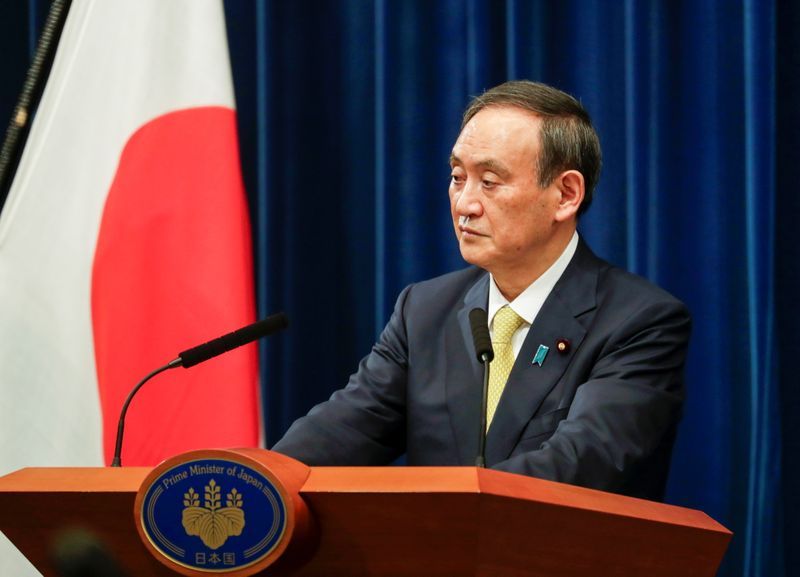 Japan's PM May further restrict tourism campaign to fight virus as approval rating plummets