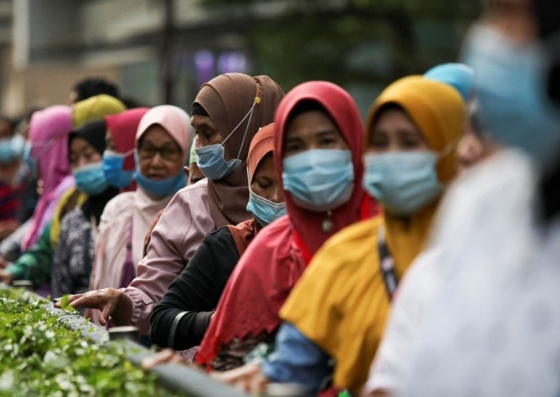 Malaysian women and children bear brunt of coronavirus lockdown